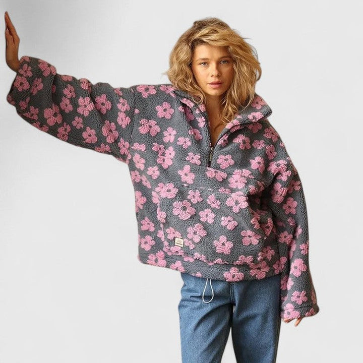 Delysanne | Maglione floreale audace con mezza zip