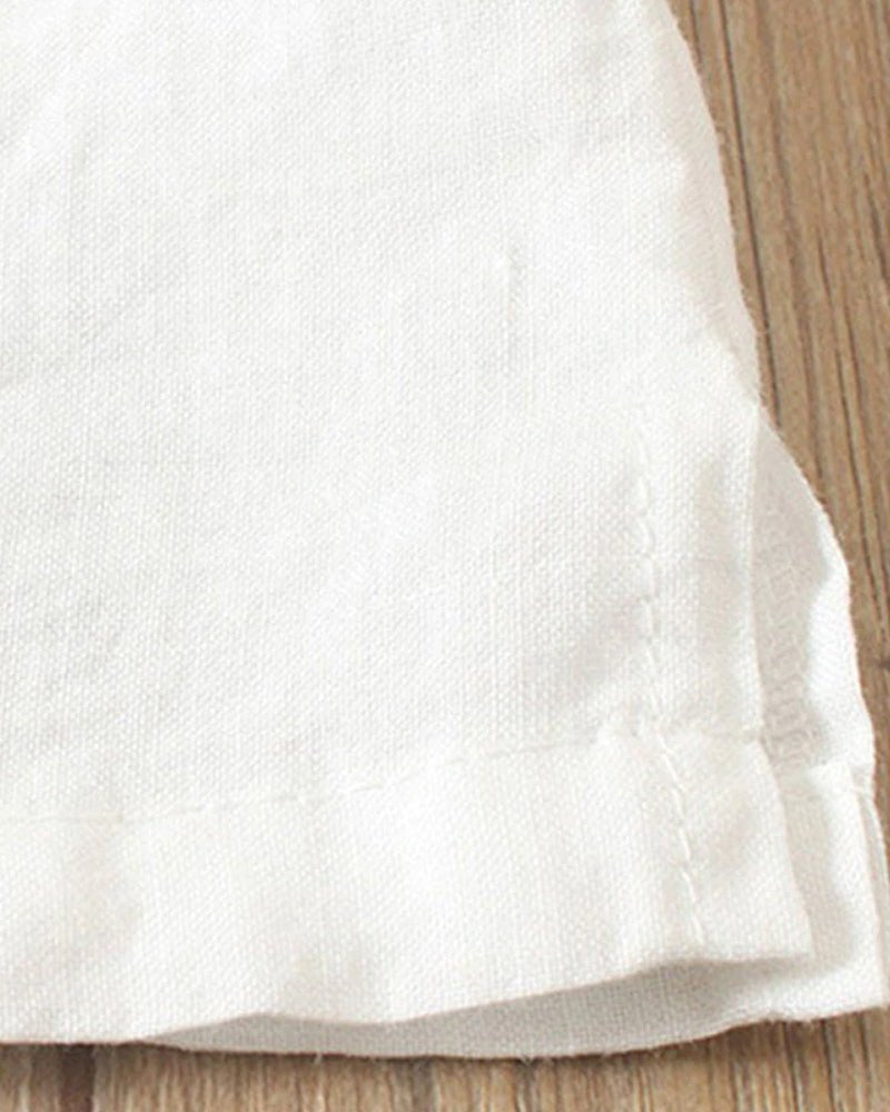 Birdie | Relaxte top met knoopdetail