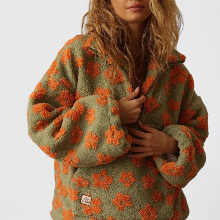Delysanne | Maglione floreale audace con mezza zip