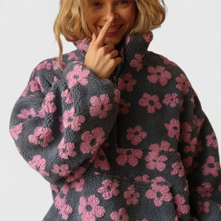 Delysanne | Maglione floreale audace con mezza zip